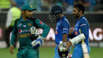 Dinesh Karthik (right) will be leading India against Pakistan in the upcoming Hong Kong Sixes, where the Men in Blue are grouped alongside arch-rivals Pakistan. AFP