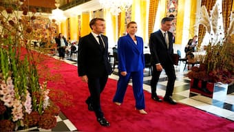 France's President Emmanuel Macron, Denmarks Prime Minister Mette Frederiksen and Spain's Prime Minister Pedro Sanchez arrive for an informal summit in the Danish parliament at Christiansborg Castle in Copenhagen, Denmark, on Wednesday. Reuters