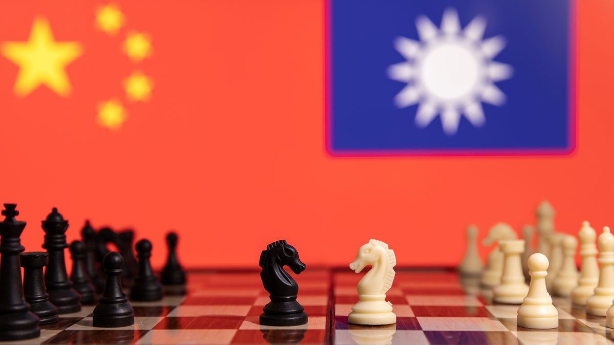 Chess pieces are seen in front of displayed China and Taiwan's flags in this illustration taken January 25, 2022. Reuters Chess pieces are seen in front of displayed China and Taiwan's flags in this illustration taken January 25, 2022. Reuters