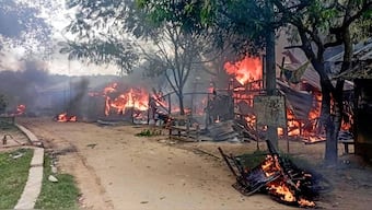 Smoke billows from a burning market area at Guimara in Khagrachari district in Bangladesh's Chittagong region on September 28, 2025, after it was set ablaze during a clash between the region's native tribals and Bengali settlers residents over the alleged rape of a girl. (Photo: AFP)