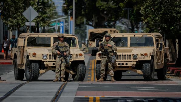 Illinois sues over National Guard deployment as Trump continues campaign against Democratic states