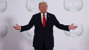 US President Donald Trump poses for a photo at a world leaders' summit on ending the Gaza war amid a US-brokered prisoner-hostage swap and ceasefire deal between Israel and Hamas at Sharm el-Sheikh, Egypt, on October 13, 2025. (Photo: Suzanne Plunkett/Pool/Reuters) 