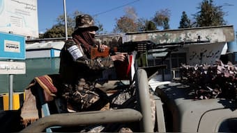 A Taliban fighter stands watch at a checkpoint in Kabul, Afghanistan November 5, 2021. (Photo: Zohra Bensemra/Reuters)
