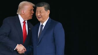 US President Donald Trump (left) and China's President Xi Jinping shake hands as they leave after their talks at the Gimhae Air Base, located next to the Gimhae International Airport, in Busan, South Korea, on October 30, 2025. (Photo: Andrew Caballero-Reynolds/AFP) 