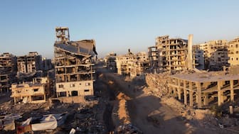 A drone view shows the destruction in a residential neighbourhood, after the withdrawal of the Israeli forces from the area, amid a ceasefire between Israel and Hamas in Gaza, in Gaza City. File Image/Reuters