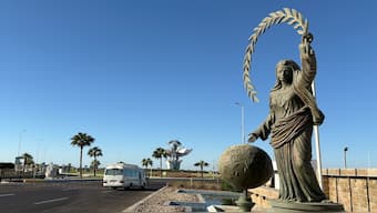 A vehicle passes at Peace Square at the Red Sea city of Sharm el-Sheikh, Egypt, where Israeli and Hamas officials are set to hold indirect talks, on Wednesday. AP