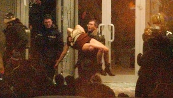 A special forces officer carries a woman out of the Dubrovka Theatre in Moscow, Russia. File image/AP
