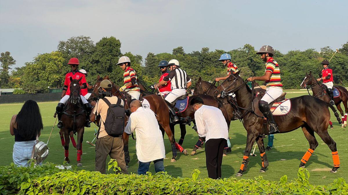 Players from the Jaipur Polo and Mayfair Polo teams can be seen in play during the final of of the Gen. Amar Singh Kanota Cup at the Rambagh Polo Ground in Jaipur on September 28, 2025. Anmol Singla/Firstpost