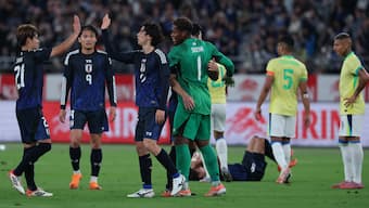 Japanese players celebrate their 3-2 victory over Brazil in an international friendly in Tokyo. Reuters