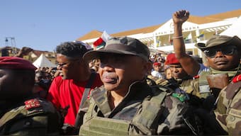 Colonel Michael Randrianirina arrives with members of the military to join protesters gathered outside the town hall on Independence Avenue during a nationwide youth-led demonstration against frequent power outages and water shortages, in Antananarivo, Madagascar, on Tuesday. Reuters