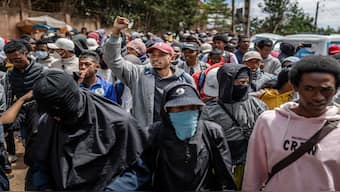 Hundreds of students march on their way to a demonstration calling for the resignation of President Andry Rajoelina, in Antananarivo, on Monday. AFP