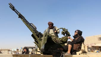 An Afghan Taliban fighter sit next to an anti-aircraft gun near the Afghanistan-Pakistan border in Spin Boldak, Kandahar Province, following exchanges of fire between Pakistani and Afghan forces in Afghanistan, on October 15, 2025. Reuters File