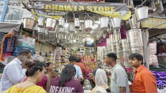 Delhi’s Chandni Chowk is a dazzling maze of lights, colours, and aromas during Diwali. From ornate diyas, decorative candles, and traditional attire to gold jewellery and sweets, every lane offers festive treasures. Kinari Bazaar and Dariba Kalan within the area are must-visits for ethnic wear and silver ornaments, making it a one-stop Diwali destination. In this image people can be seen buying utensils on Dhanteras in New Delhi. File image/PTI