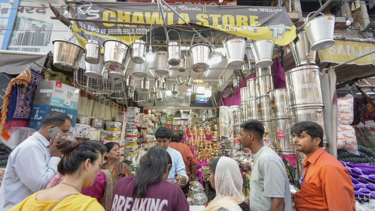 Delhi’s Chandni Chowk is a dazzling maze of lights, colours, and aromas during Diwali. From ornate diyas, decorative candles, and traditional attire to gold jewellery and sweets, every lane offers festive treasures. Kinari Bazaar and Dariba Kalan within the area are must-visits for ethnic wear and silver ornaments, making it a one-stop Diwali destination. In this image people can be seen buying utensils on Dhanteras in New Delhi. File image/PTI Delhi’s Chandni Chowk is a dazzling maze of lights, colours, and aromas during Diwali. From ornate diyas, decorative candles, and traditional attire to gold jewellery and sweets, every lane offers festive treasures. Kinari Bazaar and Dariba Kalan within the area are must-visits for ethnic wear and silver ornaments, making it a one-stop Diwali destination. In this image people can be seen buying utensils on Dhanteras in New Delhi. File image/PTI