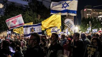 Demonstrators gather during an anti-government protest organised by the families of the Israeli hostages taken captive in the Gaza Strip since October 2023, outside the Israeli Prime Minister's residence in Jerusalem on October 4, 2025.- AFP