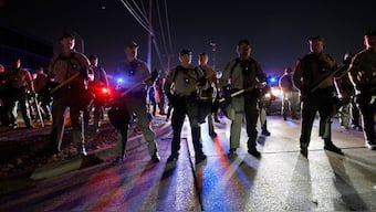 Illinois State Police stand guard while monitoring protesters gathering near an Immigration and Customs Enforcement (ICE) facility in Broadview, Illinois, on October 4, 2025.- AFP