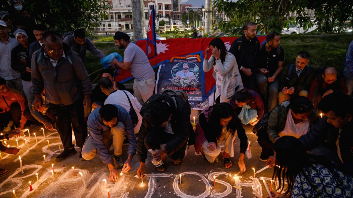 Mourners light candles and offer condolences in Kathmandu on October 15, 2025, during a candlelight vigil held for Bipin Joshi, a deceased Nepali agricultural student who died while being held hostage in Gaza by the Palestinian militant group Hamas. Image-AFP Mourners light candles and offer condolences in Kathmandu on October 15, 2025, during a candlelight vigil held for Bipin Joshi, a deceased Nepali agricultural student who died while being held hostage in Gaza by the Palestinian militant group Hamas. Image-AFP