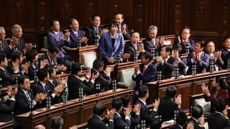 Leader of Japan's ruling Liberal Democratic Party (LDP) Sanae Takaichi reacts as she receives applause after being elected as prime minister, at the Lower House of Parliament in Tokyo, Japan, October 21, 2025. File Image/Reuters