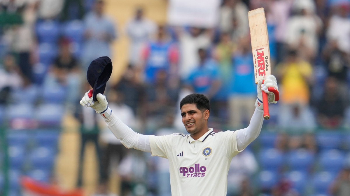 India captain Shubman Gill celebrates after completing his century on Day 2 of the second Test against West Indies in Delhi. AP India captain Shubman Gill celebrates after completing his century on Day 2 of the second Test against West Indies in Delhi. AP