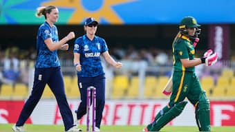 South Africa's Sune Luus walks towards the pavilion after getting clean bowled by England pacer Lauren Bell. AP