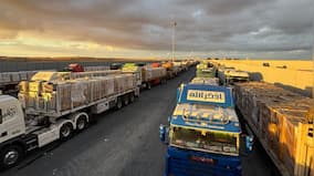 Aid trucks begin to enter Gaza as Hamas confirms hostage release on Monday