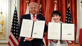 US President Donald Trump and Japanese Prime Minister Sanae Takaichi hold up signed documents regarding securing the supply of critical minerals and rare earths, at a bilateral meeting at Akasaka Palace in Tokyo, Japan, October 28, 2025. File Image/Reuters