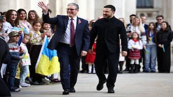British Prime Minister Keir Starmer and Ukrainian President Zelenskyy are greeted by Ukrainian school children as they arrive at the Foreign, Commonwealth, and Development Office (FCDO), for a meeting of the Coalition of the Willing, in London, Britain, on Friday. Reuters