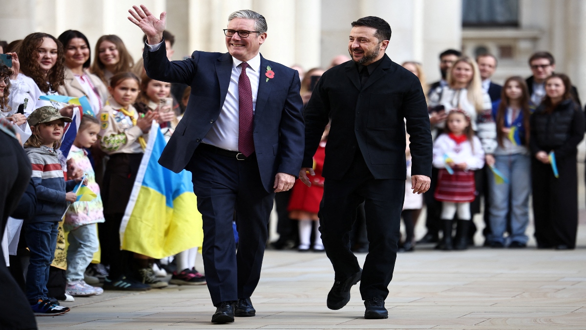 British Prime Minister Keir Starmer and Ukrainian President Zelenskyy are greeted by Ukrainian school children as they arrive at the Foreign, Commonwealth, and Development Office (FCDO), for a meeting of the Coalition of the Willing, in London, Britain, on Friday. Reuters British Prime Minister Keir Starmer and Ukrainian President Zelenskyy are greeted by Ukrainian school children as they arrive at the Foreign, Commonwealth, and Development Office (FCDO), for a meeting of the Coalition of the Willing, in London, Britain, on Friday. Reuters