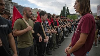 Students take part in a demonstration as part of a one-day general strike in Athens on October 1, 2025. AFP