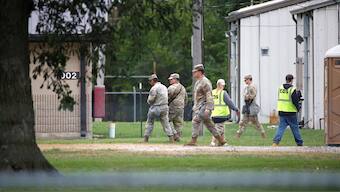Texas Army National Guard troops are seen at the Army Reserve Training Center in Elwood, Illinois, after being deployed as part of the federal response to ongoing immigration enforcement operations, on October 7, 2025. AFP