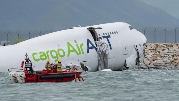 Boeing 747 skids of Hong Kong runway, killing two