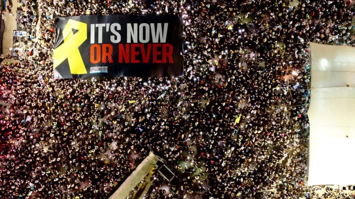 <div>Tens of thousands in Israel rally for release of hostages, raise concerns over far-right's interference</div>
