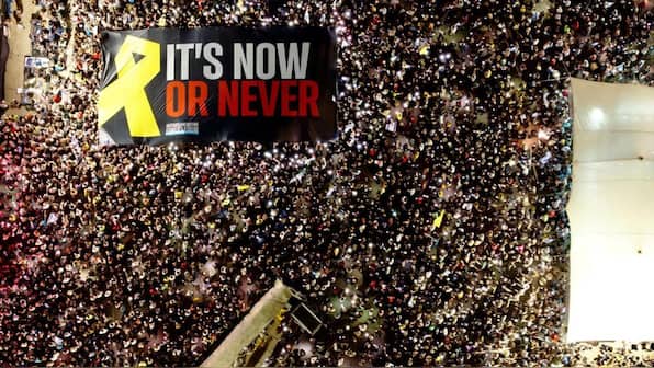 Tens of thousands in Israel rally for release of hostages, raise concerns over far-right's interference