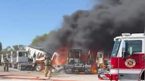 2 killed as plane crashes into trailers near Texas airfield, nearby building catches fire