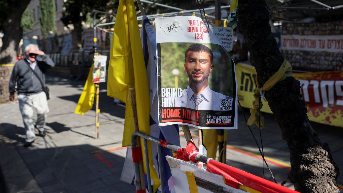 A poster of hostage Bipin Joshi, a citizen of Nepal, displayed at the protest camp for hostages kidnapped during the deadly October 7 attack, in the vicinity of Israeli Prime Minister Benjamin Netanyahu's Jerusalem residence. After 738 days, his body was released to Israel with officials informing the family of the loss. File image/Reuters A poster of hostage Bipin Joshi, a citizen of Nepal, displayed at the protest camp for hostages kidnapped during the deadly October 7 attack, in the vicinity of Israeli Prime Minister Benjamin Netanyahu's Jerusalem residence. After 738 days, his body was released to Israel with officials informing the family of the loss. File image/Reuters