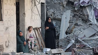 Palestinians recover a body from the rubble of a house destroyed in an overnight Israeli strike in Gaza City on October 29, 2025. (AFP file)
