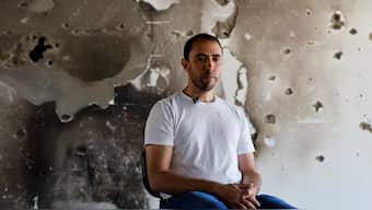 Tal Shoham, a former hostage kidnapped by Hamas on October 7, 2023, along with his wife, two children, and three other family members, looks on during an interview at Kibbutz Be’eri in southern Israel on September 15, 2025. Shoham and his family were held in Gaza for 505 days. (Photo: REUTERS/Amir Cohen)