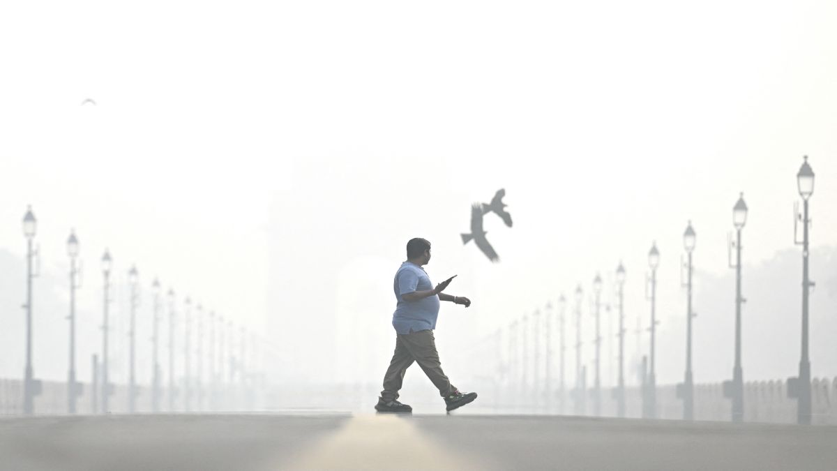 A pedestrian walks amid smog, near India Gate in New Delhi on October 29, a day after cloud seeding trials took place. Unfortunately, it didn't induce rain, leaving Delhiites dismayed. AFP A pedestrian walks amid smog, near India Gate in New Delhi on October 29, a day after cloud seeding trials took place. Unfortunately, it didn't induce rain, leaving Delhiites dismayed. AFP
