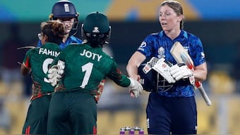 Heather Knight shakes hands with Bangladesh players after winning the game. Image: Reuters