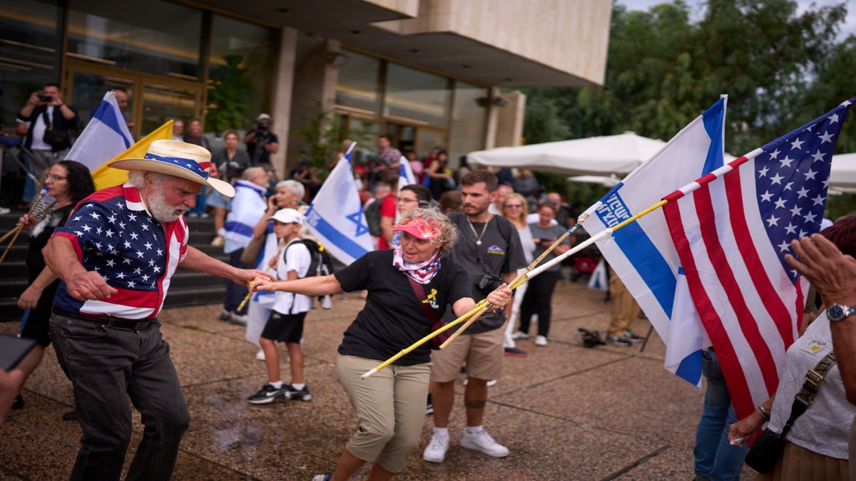 People celebrate with dancing at Hostages Square in Tel Aviv after Israel's Cabinet approved the first phase of a peace plan to pause the fighting — despite opposition from far-right members. (AP) People celebrate with dancing at Hostages Square in Tel Aviv after Israel's Cabinet approved the first phase of a peace plan to pause the fighting — despite opposition from far-right members. (AP)