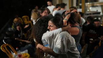 Relatives and supporters of Israeli hostages held by Hamas in the Gaza Strip celebrate after the announcement that Israel and Hamas have agreed to the first phase of a peace plan. AP