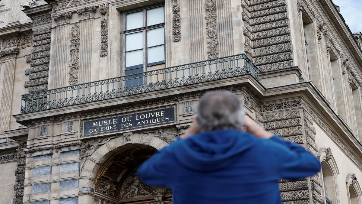 A man takes a picture of a broken window protected by a wooden panel at the Louvre Museum as the museum remains closed after a spectacular jewel heist by thieves who broke into the landmark by using a crane and smashing an upstairs window, stealing priceless jewelry from an area that houses the French crown jewels before escaping on motorbikes, in Paris, France. Reuters A man takes a picture of a broken window protected by a wooden panel at the Louvre Museum as the museum remains closed after a spectacular jewel heist by thieves who broke into the landmark by using a crane and smashing an upstairs window, stealing priceless jewelry from an area that houses the French crown jewels before escaping on motorbikes, in Paris, France. Reuters