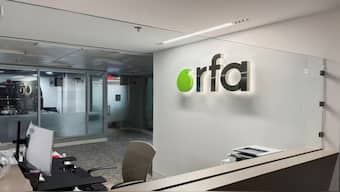 A logo of Radio Free Asia is displayed in its office, following the termination of funding for RFA, which broadcasts in nine Asian languages, a day after U.S. President Donald Trump signed an executive order gutting the government-funded media outlet's parent and six other federal agencies, in Washington, D.C. Reuters