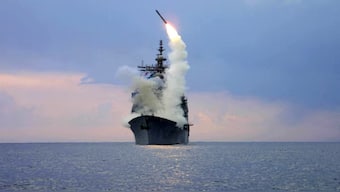 A Tomahawk Land Attack Missile (TLAM) is launched from the guided missile cruiser USS Cape St. George, March 23, 2003. Reuters