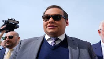   Former U.S. Rep. George Santos arrives at federal court for sentencing, April 25, 2025, in Central Islip, N.Y. AP