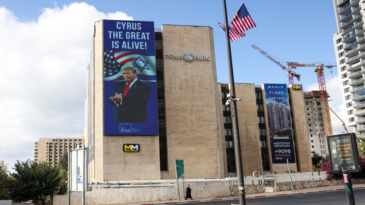 A woman walks past a billboard depicting US President Donald Trump in Jerusalem Israeli prime minister's office said that the government had "approved the framework" of a hostage release deal with Hamas. AFP A woman walks past a billboard depicting US President Donald Trump in Jerusalem Israeli prime minister's office said that the government had "approved the framework" of a hostage release deal with Hamas. AFP