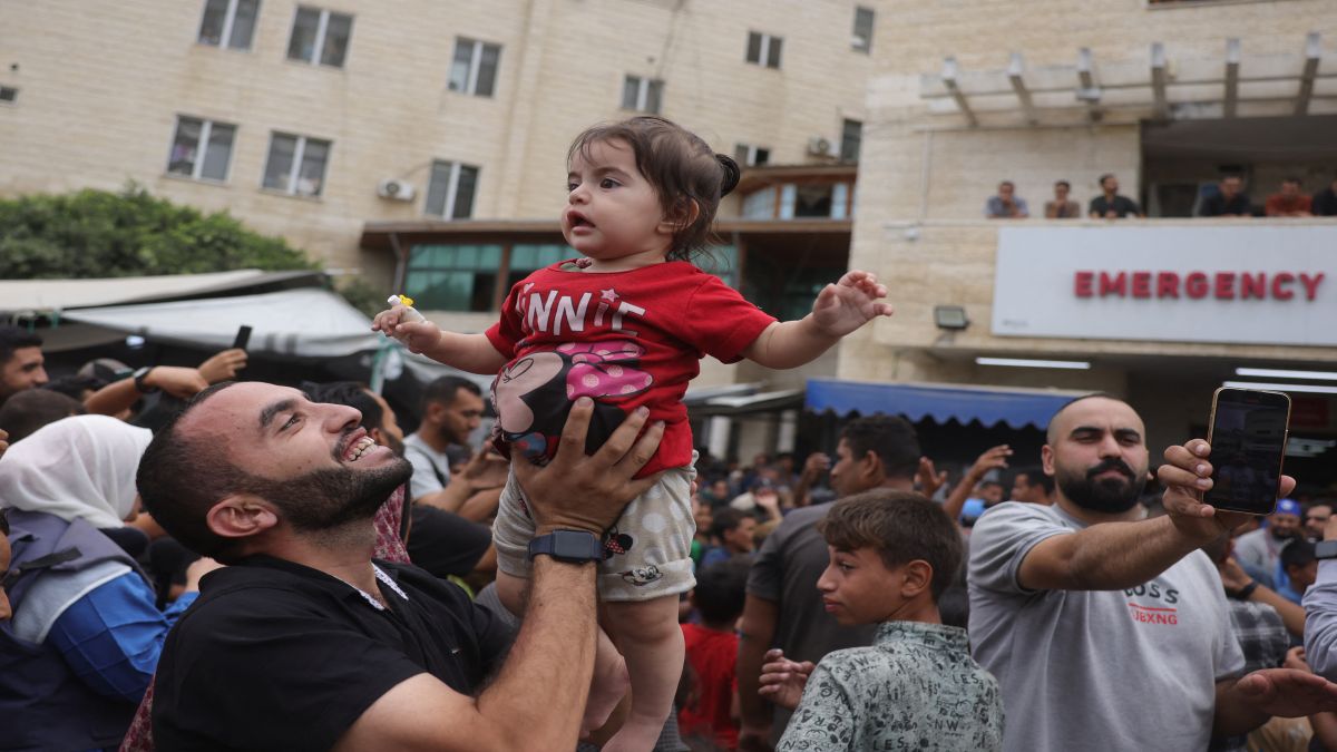 Palestinians celebrate outside Deir al-Balah's Shuhada al-Aqsa hospital in the central Gaza Strip, following news of a new Gaza ceasefire deal. AFP Palestinians celebrate outside Deir al-Balah's Shuhada al-Aqsa hospital in the central Gaza Strip, following news of a new Gaza ceasefire deal. AFP