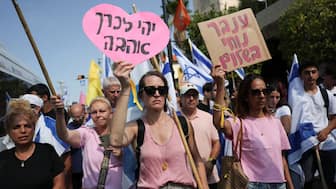 Friends, families and the wider Israeli public attend the funeral procession of slain hostage Inbar Hayman, who, according to the Israeli army, was killed during the deadly attack by Hamas on October 7, 2023 after attending the Nova festival and her body was taken to Gaza, in Israel October 17, 2025. Attendees dress in pink in honour of Inbar Hayman, who was a talented graffiti artist. While Hamas has returned some bodies, at least 19 have not been handed over to Israel. Reuters