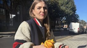 Who is the woman captured on camera cutting ribbons dedicated to Israeli hostages in London?