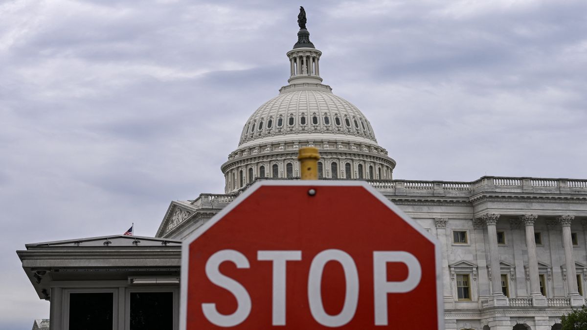 A stop sign is seen in front of the US Capitol dome in Washington, DC. The United States government is witnessing its first shutdown in six years. AFP A stop sign is seen in front of the US Capitol dome in Washington, DC. The United States government is witnessing its first shutdown in six years. AFP